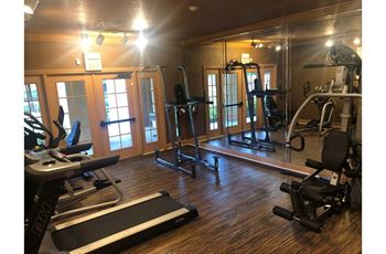 Fitness Room with cardio equipment at Hibiscus Pointe, Miami Florida